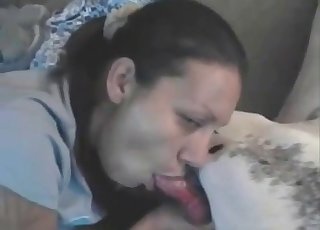 Brunette deepthroats dog cock