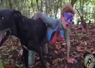 Outdoor fuck movie showing a MILF and her dog