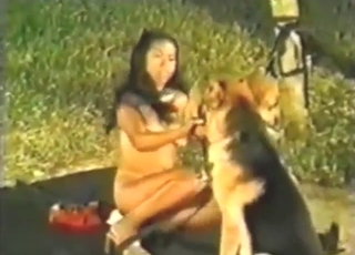 Zoo porn shows a tanned Latina fucking a dog