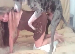 Trained dog licks her wide-opened tight vagina