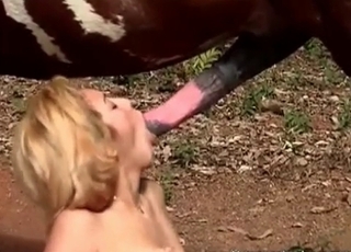 Blonde Latina is having sexy fun with a horse