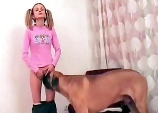 Loli-looking babe seduced by a dog